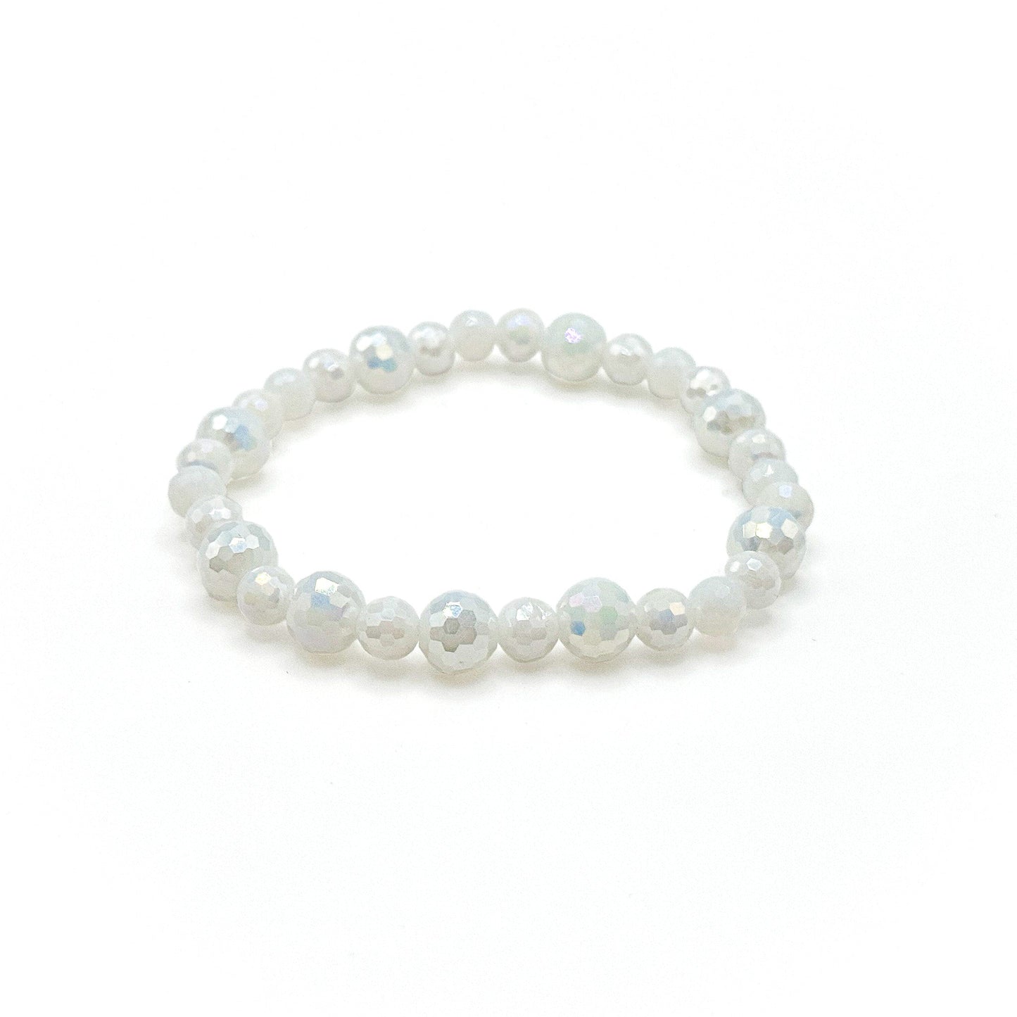 Cupid Bracelet White Pearlescent Crystal Beads Two Sizes On Stretch Cord Exclusive Collection