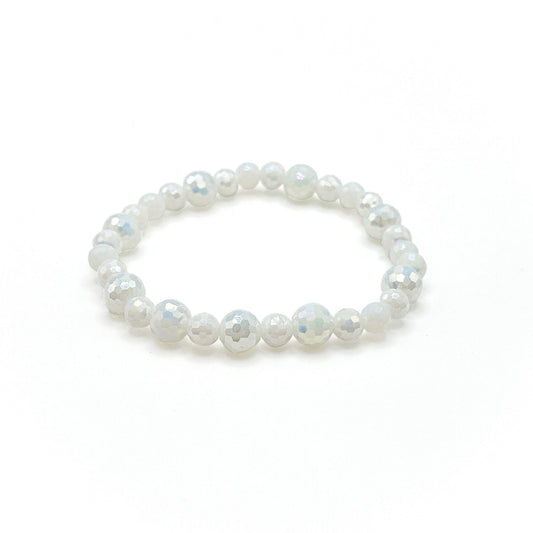 Cupid Bracelet White Pearlescent Crystal Beads Two Sizes On Stretch Cord Exclusive Collection