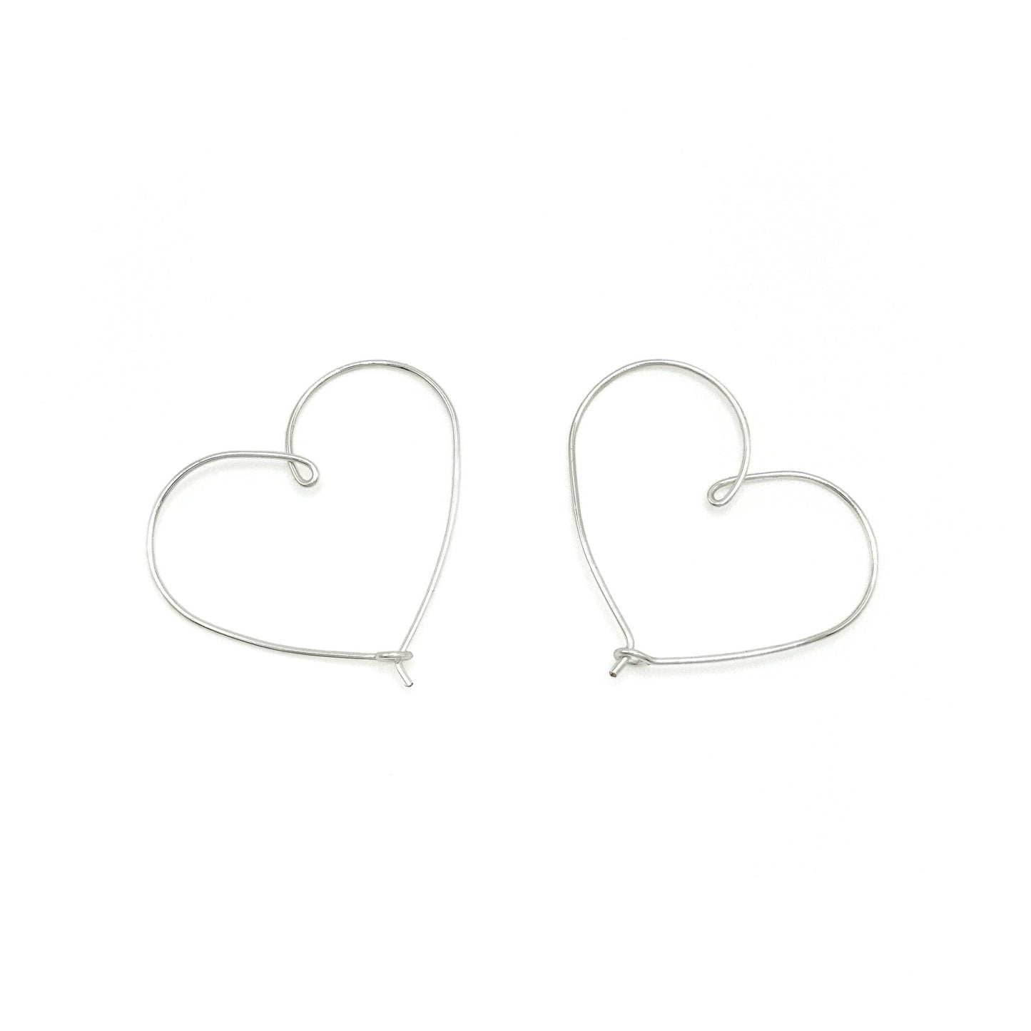 Silver Plated Heart Hoop Earrings Handcrafted Sweetheart Collection One And A Quarter Inch Diameter Limited Edition